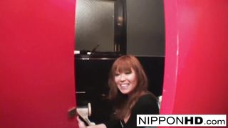 Рыжая японка мастурбирует мохнатую киску, сидя на унитазе в туалете ресторана