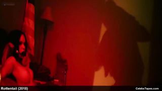 Голые титьки в постельных сценах с Эмили Мена и Кьюби Арбогаст в ужастике «Гнилохвост»